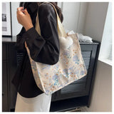 UAKISS  -  Flower Printed Women's Shoulder Bags 2024 Fashion Shopping Large Capacity Handbag Student Girls Canvas Book Tote With Pendant