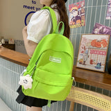 UAKISS  -  Hot Selling High-quality Solid Nylon Women's Backpack 2024 New Youth Campus Girl Backpack Cute Pendant Zipper Pocket