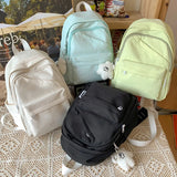 UAKISS  -  Small High Quality Waterproof Solid Color Nylon Women Backpack Casual Travel Rucksack School Bags for Teenage Girl Boys New